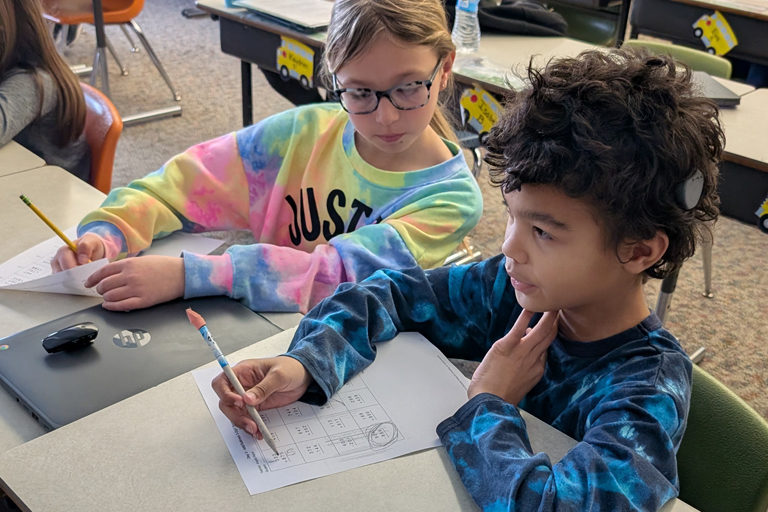 Two students working together