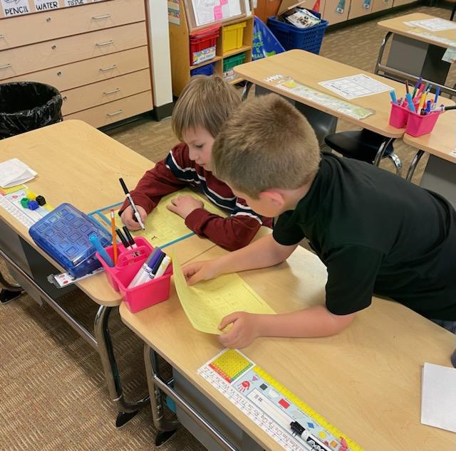 Students working on math together
